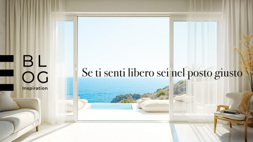 Blog Inspiration Valentini Arredamenti - Soggiorno luminoso con vetrata scorrevole vista mare e tende bianche